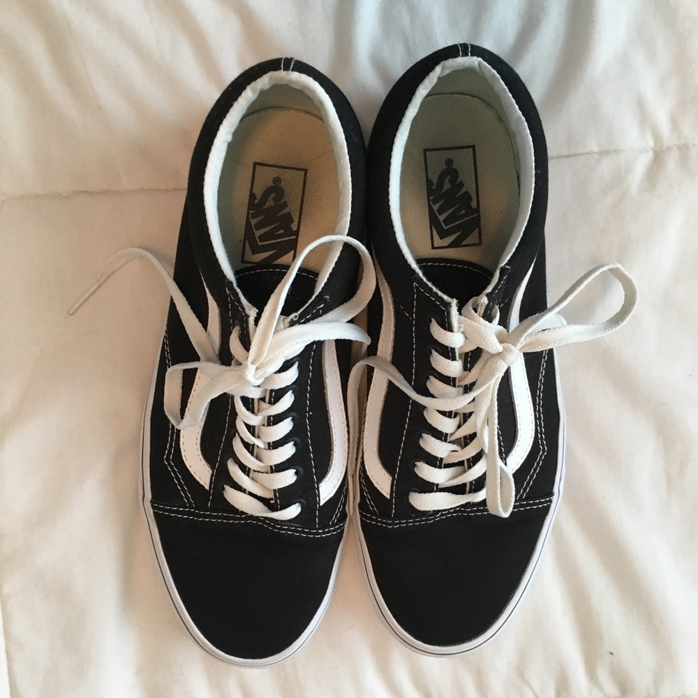 Black old skool vans.